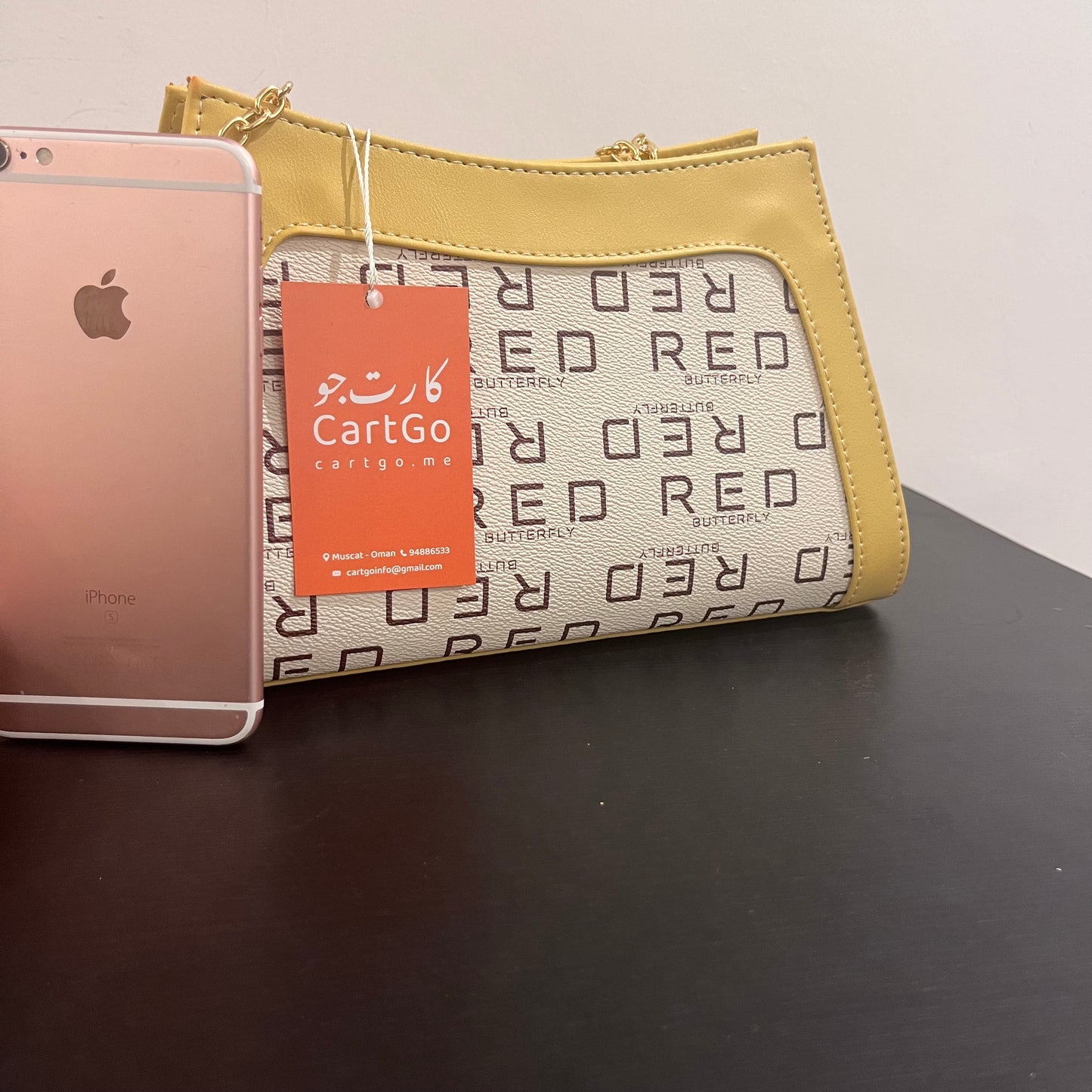 حقيبة لون خردلي بنمط أحرف Monogram patterned masterd color handbag