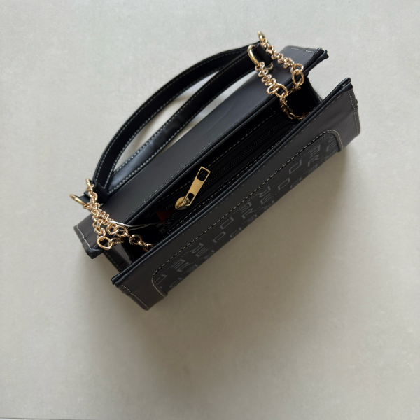 حقيبة لون أسود بنمط أحرف Monogram patterned black color handbag