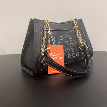 حقيبة سوداء بنمط  monogram patterned black handbag