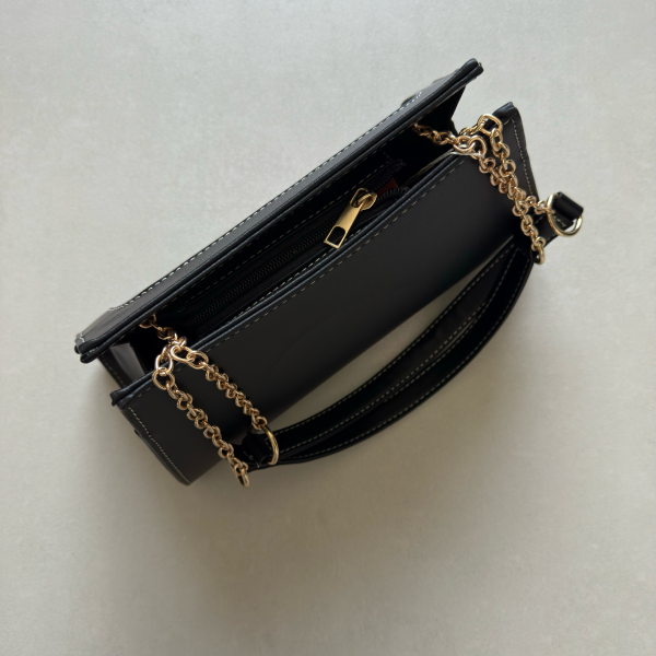 حقيبة لون أسود بنمط أحرف  Monogram patterned black color handbag
